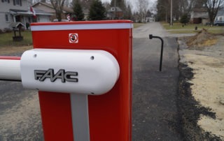 FAAC swing arm barrier gate