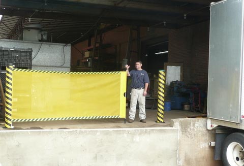 Retractable Safety Barrier with Person Extending it