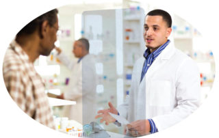 Pharmacist behind single temporary plexiglass safety shield