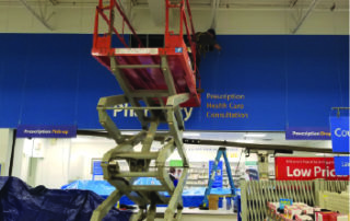 Walmart North Barrie Pharmacy Doors During Construction with scissor lift