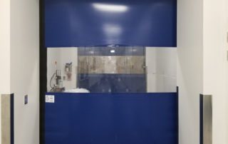 pharmaceutical fabric roll up door with touchless entry