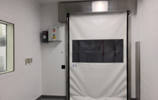 pharmaceutical fabric roll up door with touchless entry