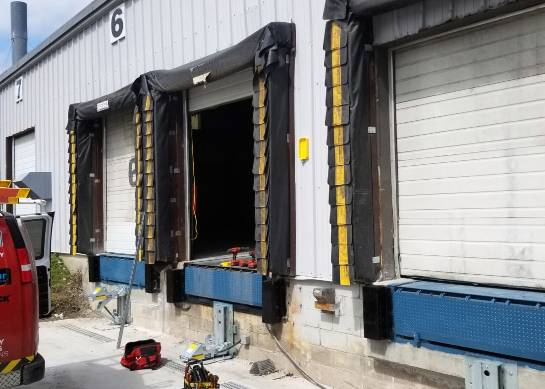 install MTL mechanical vehicle restraint and heavy-duty hydraulic dock leveler
