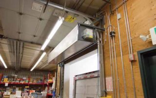 Industrial direct drive air curtain loading dock door