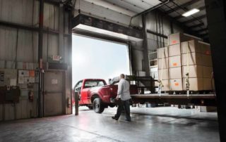 Industrial direct drive air curtain drive through door