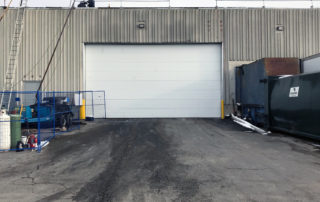 Large steel sectional overhead door hubberts outside