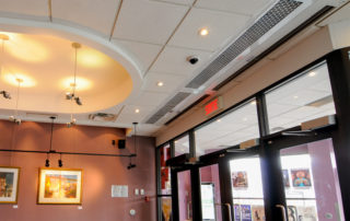 Architectural recessed air curtain sliding door entrance art gallery