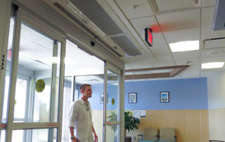 Architectural recessed air curtain doctors office sliding door entrance