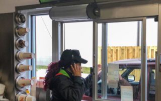 Restaurant drive thru window air curtain