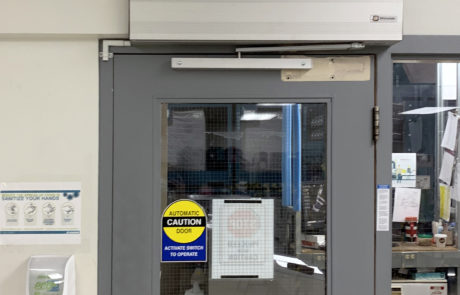 warehouse manufacturing plant touchless wave sensor automatic swing door lunchroom