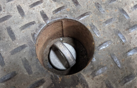 Pull Chain Plug for dock leveler in hole