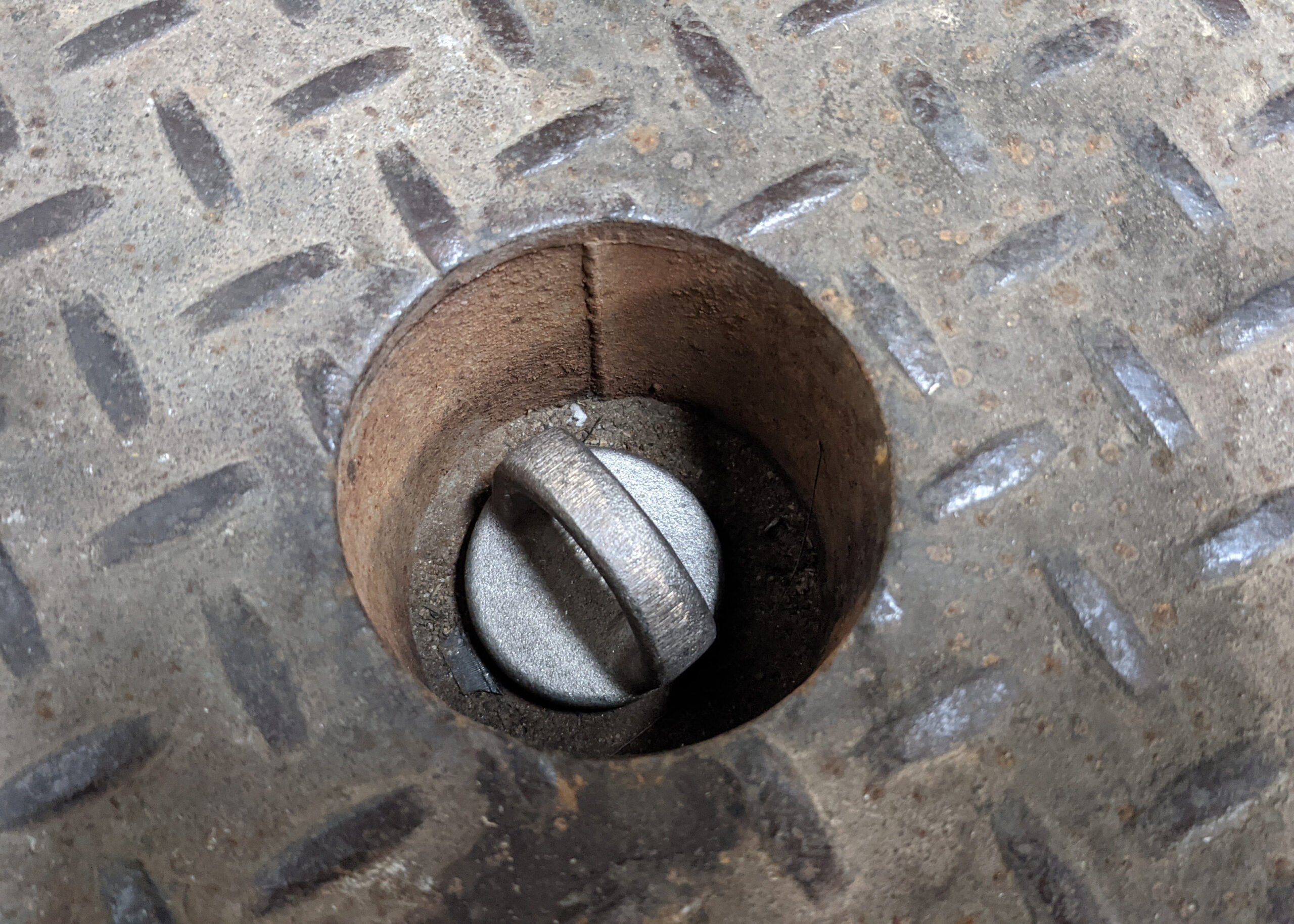 Pull Chain Plug for dock leveler in hole