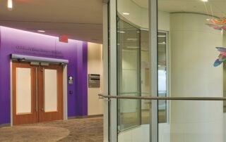 SW200i Surface Mounted Swing Door Operator Clinic Entrance