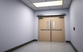 SW200i Surface Mounted Swing Door Operator Corridor