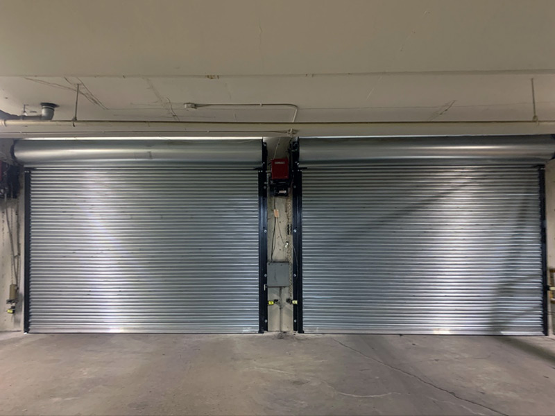Inside view of rolling steel parking garage doors for condos
