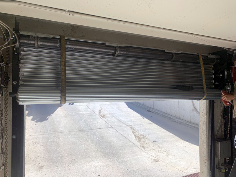rolling steel parking garage door installation