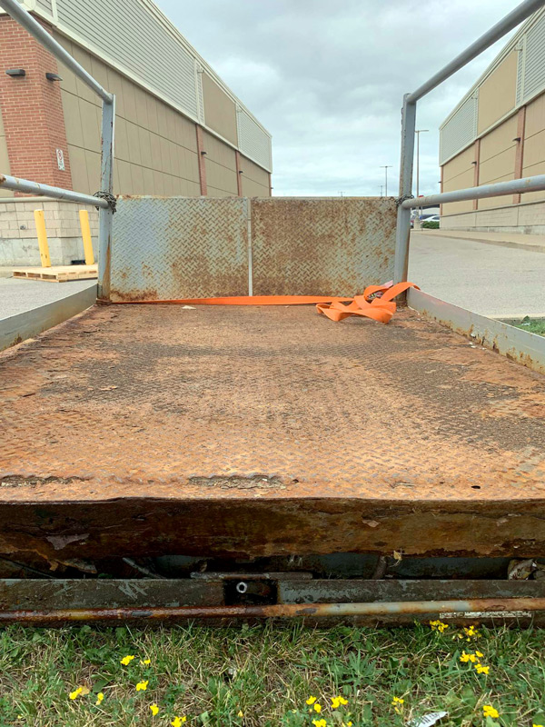 retail store mall outdoor dock lift table rust rotten old before