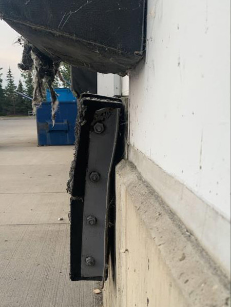 laminate dock bumper worn damage before bent warehouse calgary