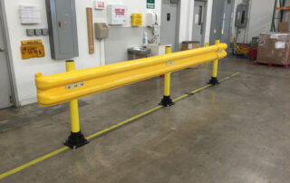 SlowStop guardrail warehouse guarding flexible rebounding polycarbonate railing in use protecting pedestrian walkway