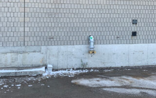 Before new loading dock and door solid brick wall