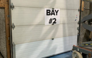 after bottom overhead section door replacement, loading dock leveler plate, steel face dock bumpers calgary alberta