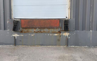 Before old rusted dock leveler with falling dock bumper calgary alberta