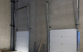 dock pit construction overhead sectional steel door