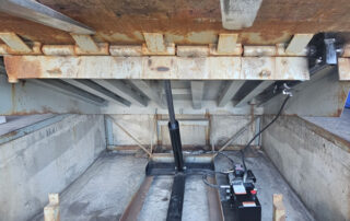 After hydraulic conversion kit loading dock leveler plate pit Carstairs Alberta warehouse position 5 pit cleaning