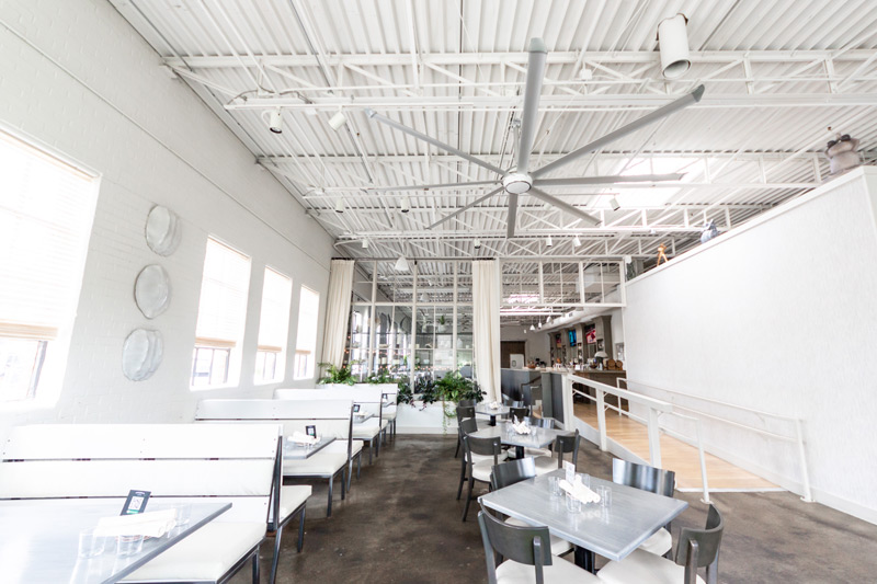 BAF Big Ass Fans Essence commercial HVLS fan in restaurant public space