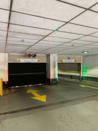 Garage door rubber doors with LED red/green lite advance door monitoring lights, door is fully open so light is green