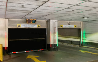 Garage door rubber doors with LED red/green lite advance door monitoring lights, door is fully open so light is green