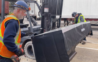 blue giant rain shroud dock canopy dock seal installation technicians forklift