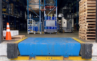 After replacement hydraulic dock leveler burnaby BC warehouse outside dock lowered