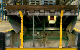 before replacement hydraulic dock leveler burnaby BC warehouse outside dock raised