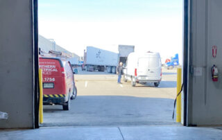 after berner industrial air curtain barrier blade drive-in through door open