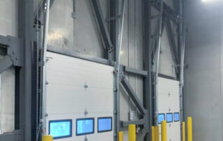 Before Calgary Farmers' Market inside steel section overhead doors with windows