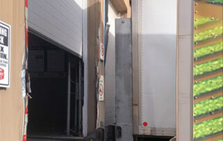 No dock seals, gaps around trailer, building damage at Calgary Famers' Market loading dock