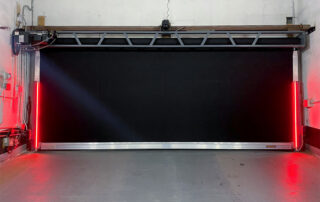 after toronto large wide parking garage hormann high-speed low headroom rubber door lite-advance LED door monitoring light red closed inside