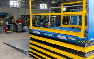 Blue Giant dock lift with custom ramp and accordion safety skirt raised