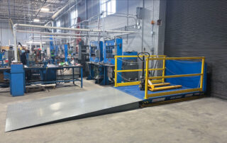 Blue Giant dock lift with custom ramp for manual pallet trucks