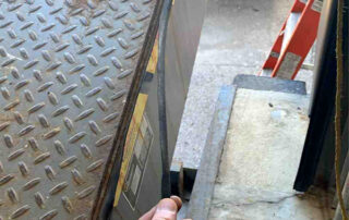 mechanical dock leveler plate loading dock preventive maintenance PMP Before - Position 1 – Dock - Damaged right weather seal.